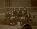Father Finn with Students at St. Mary's College