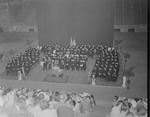 Commencement ceremony stage with graduates