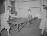 Alumnae Association members playing ping-pong