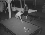 Alumnae Association members playing pool