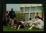 Students Relaxing on Lawn by Gregory Rust