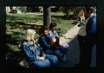 Xavier University Students Sitting on a Bench by Gregory Rust