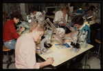 Students Using Microscopes in Lab by Gregory Rust